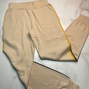 Stylish Cream Track Pants with Yellow Accents